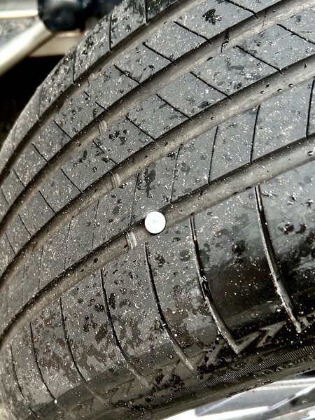 tyre with screw