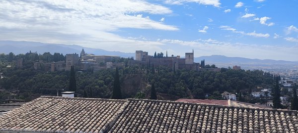 a panoramic view of the Alhambra in Granada from the San Nicolas viewpoint
